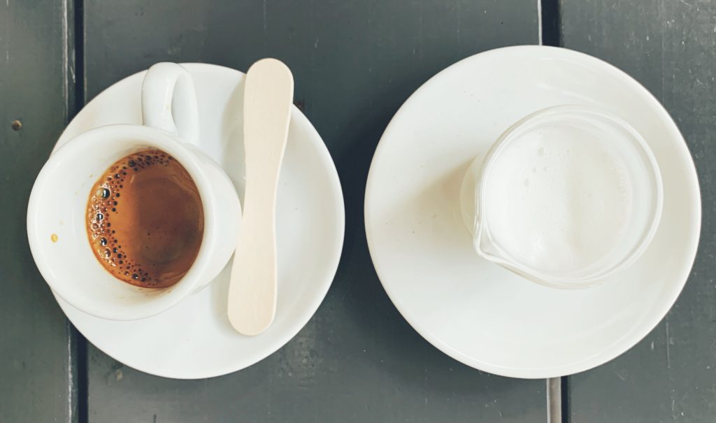 Beautifully presented espresso with milk