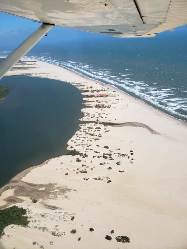 Aerial view of where the river meets the ocean
