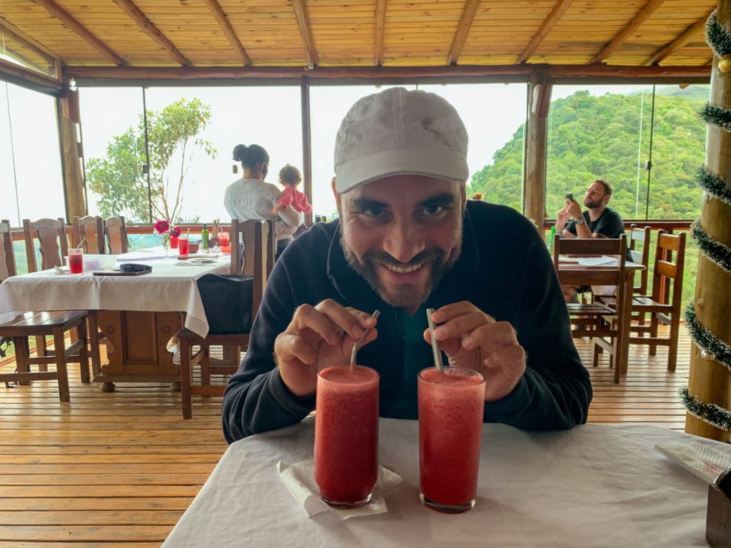 Andrey trying the juices at Restaurante Casal Garcia