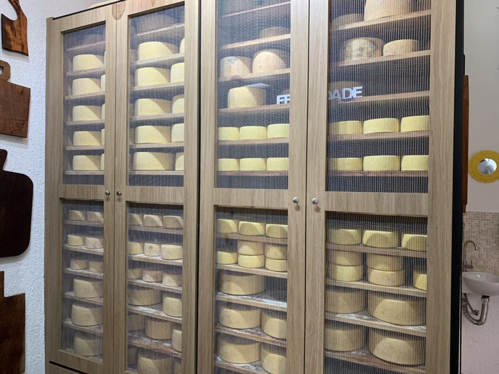 Parmesan-style cheeses aging