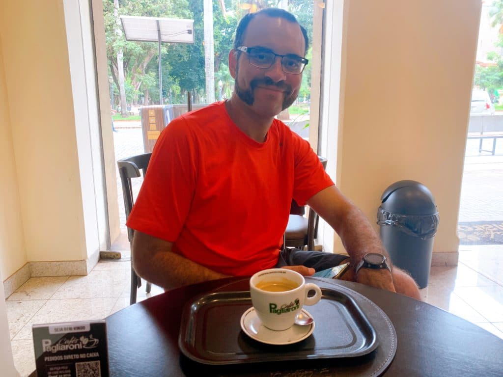 Andrey with his coffee from Café Pagliaroni