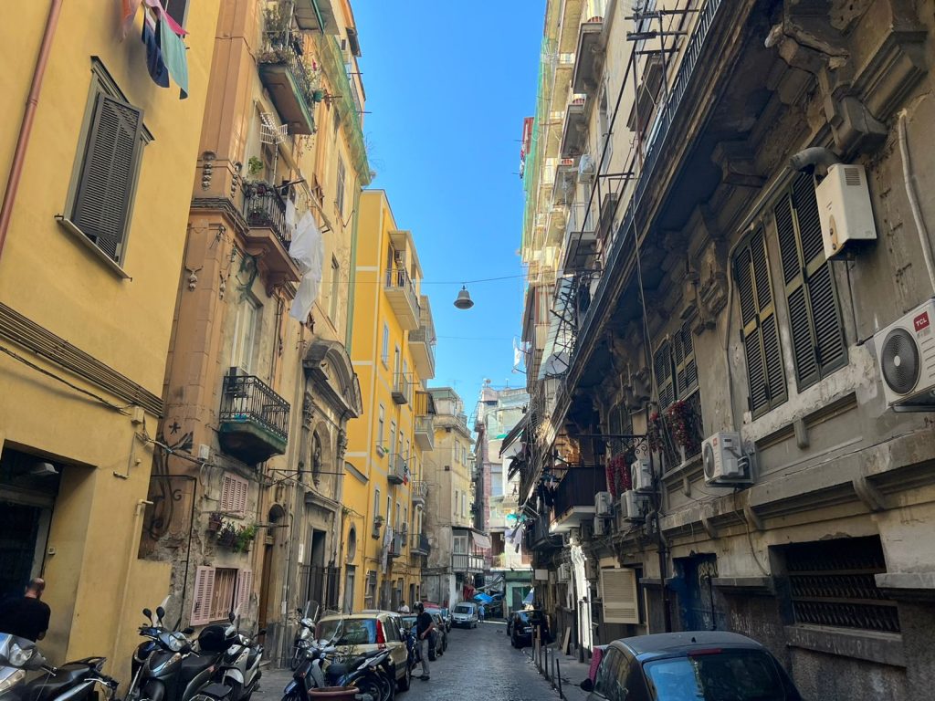 Laundry lines hanging in the narrow streets of Naples, Italy